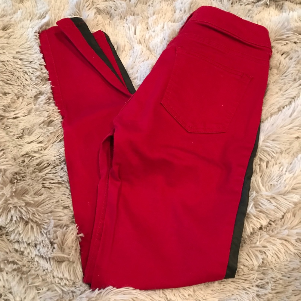 Red skinny jeans with leather piping